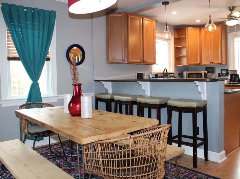 Dining area offers lots of seating for up to 12, including the expansive counter