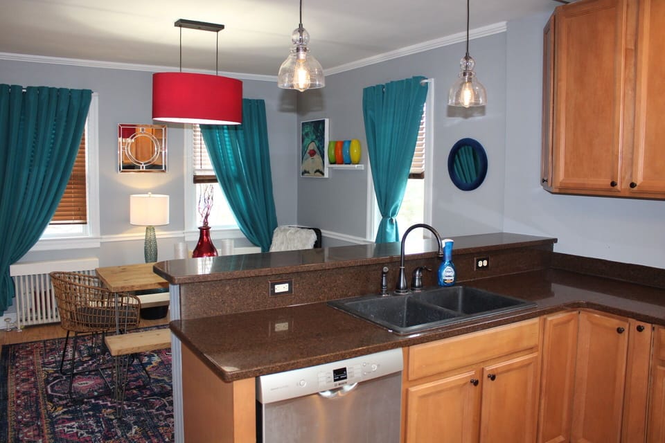 Peaking through the kitchen into the dining room.