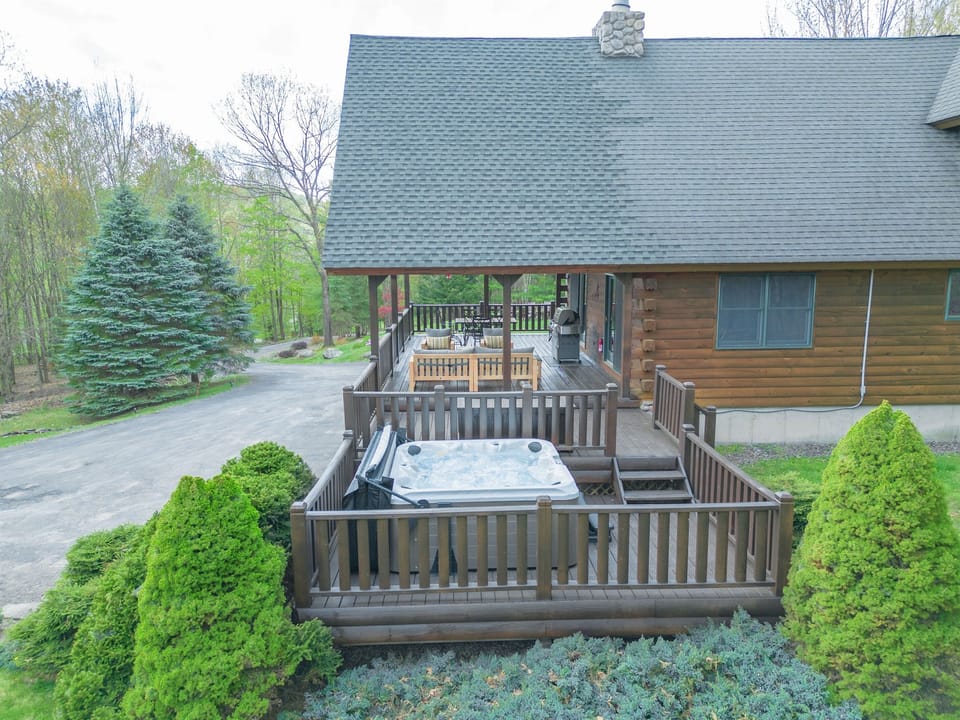 Enjoy the 6-person hot tub all year long