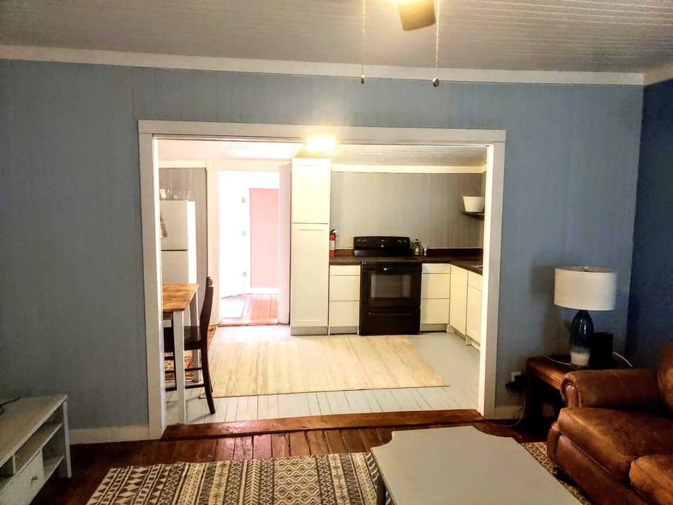 Living room view into kitchen