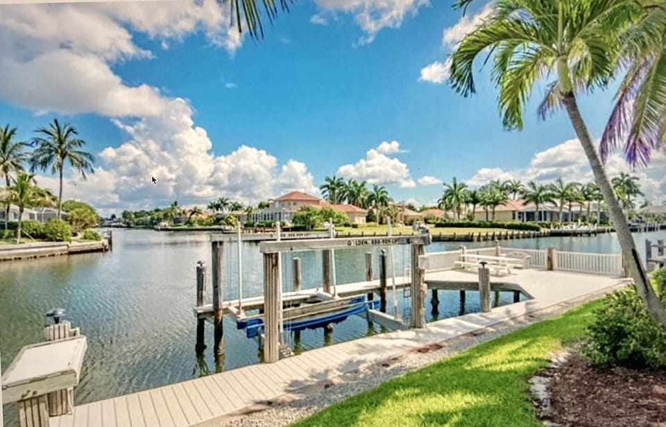 Large boat dock and sitting area to watch the dolphins swim by!