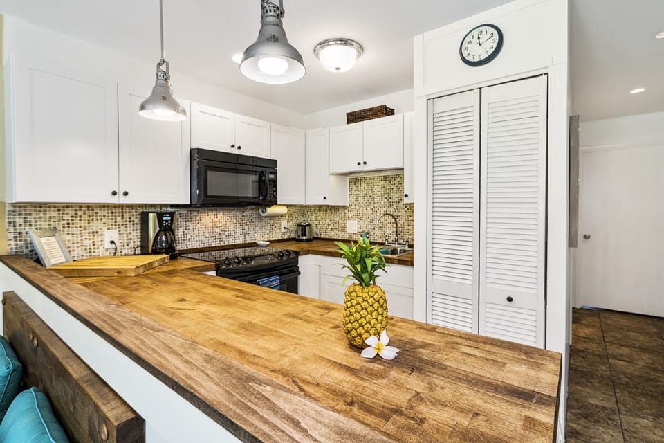 Nicely updated kitchen with washer dryer in the kitchen.