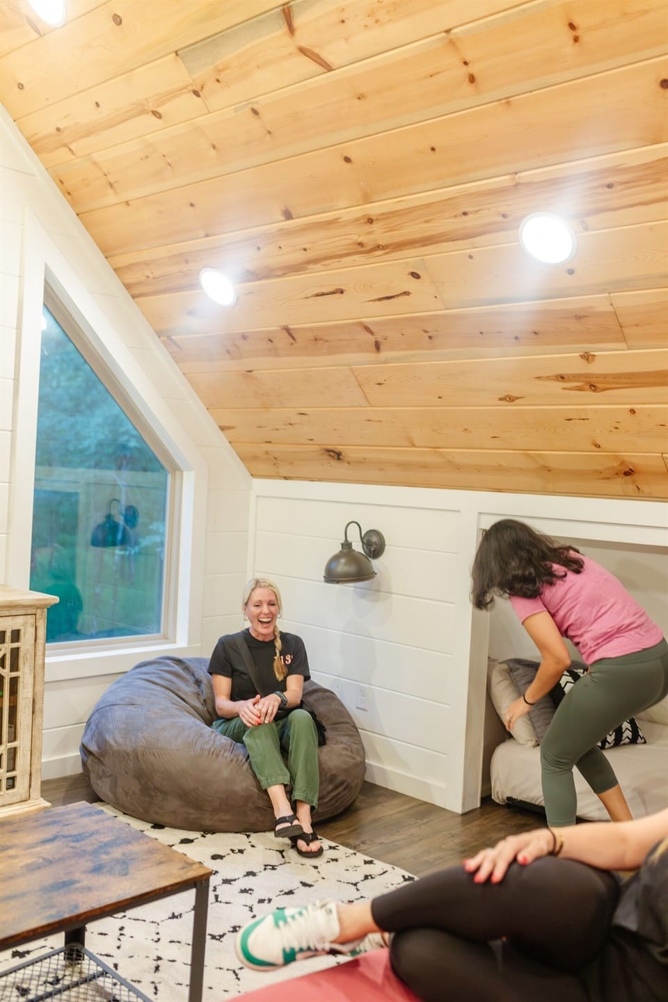 Spacious game loft with 4 twin beds—perfect for lounging, gaming & relaxing