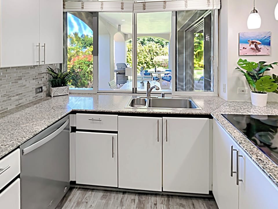 Sleek countertops & upgraded appliances for effortless vacation cooking.