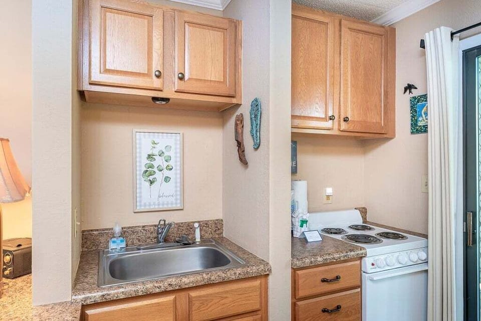 Surrounded by some luxury with granite counter tops and stainless steel.