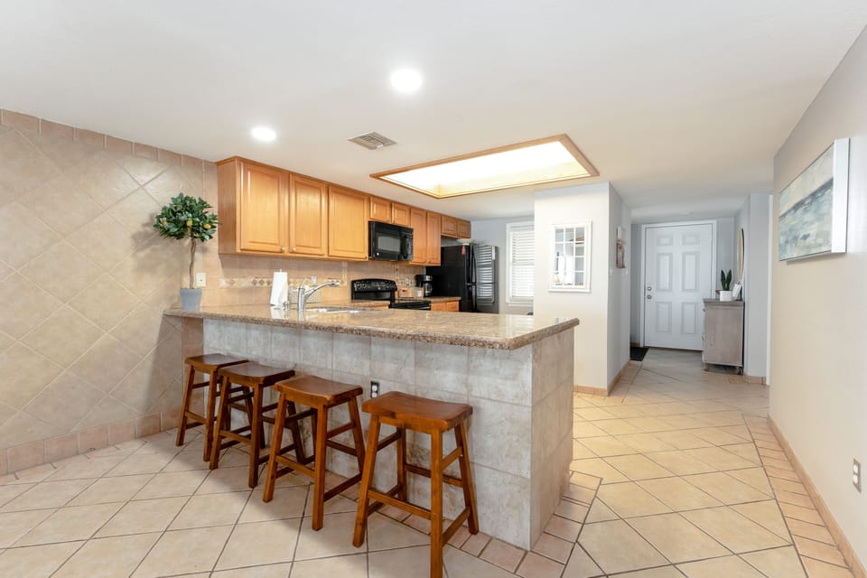 Our brunch bar looks into the kitchen which makes meal times a fun experience for the whole family.