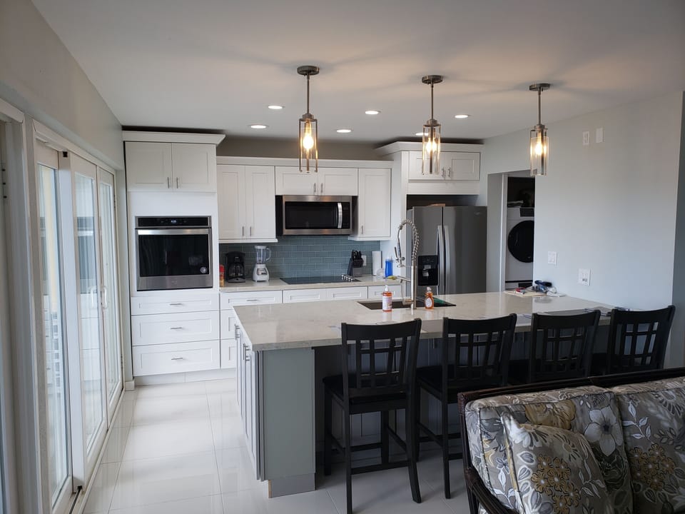 Kitchen with large Island and barstools