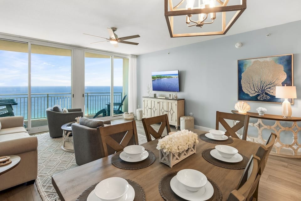 Gulf Front Dining! This beautifully remodeled and decorated home features stunning views of the Gulf of Mexico and Panama City Beach through floor to ceiling windows.