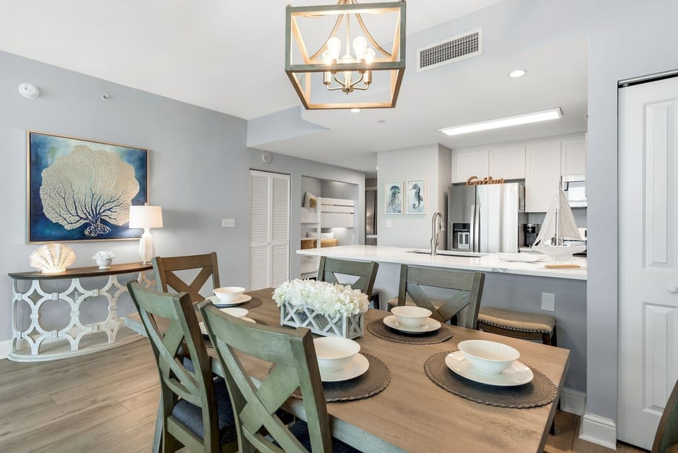 Gulf Front Dining! This beautifully remodeled and decorated home features stunning views of the Gulf of Mexico and Panama City Beach through floor to ceiling windows.