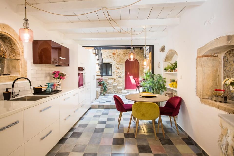 The modern fully equipped kitchen and dining room