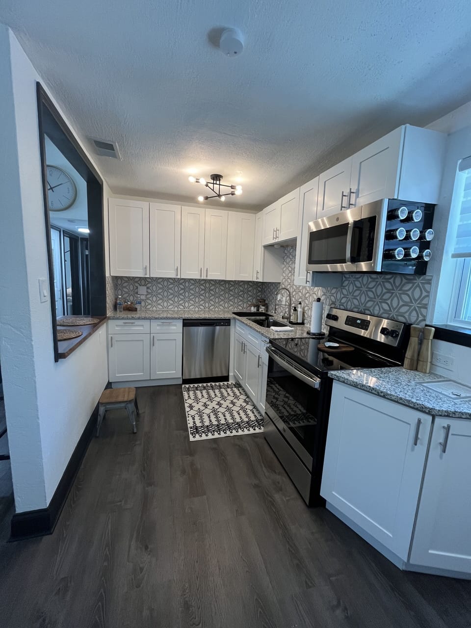 kitchen is well stocked with mint&  matching - everything needed to dine & host