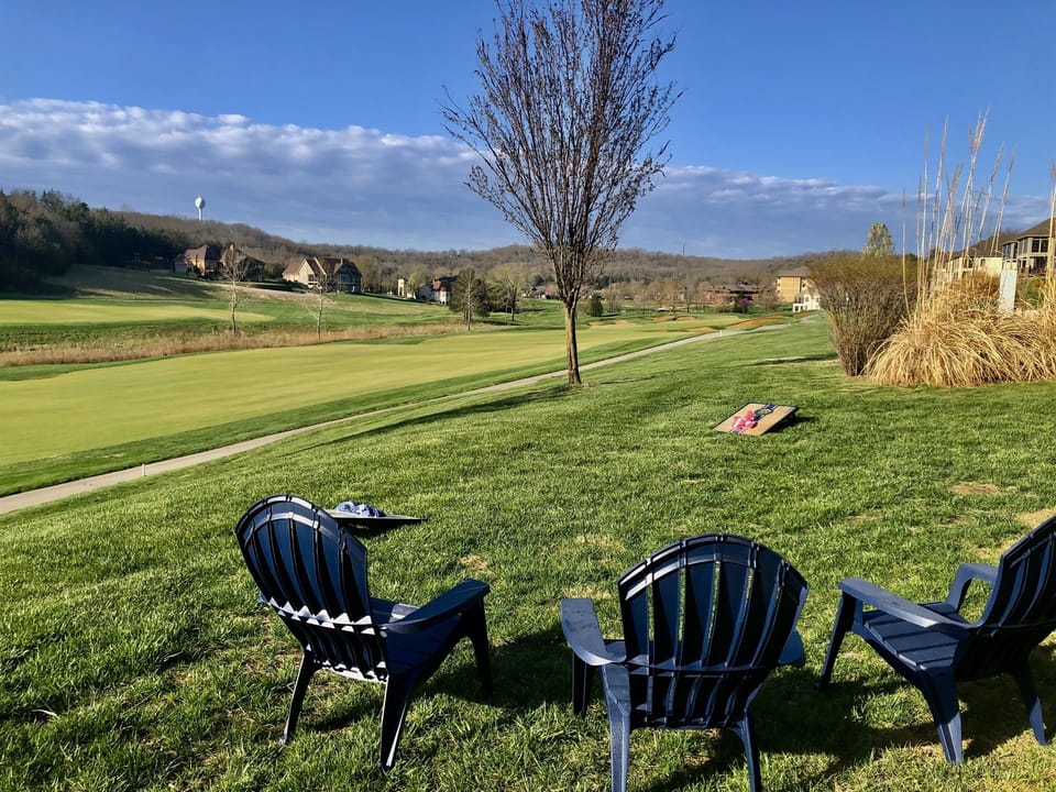 backyard w/ room for games, just steps away on 14th fairway, 8 adirondack chairs
