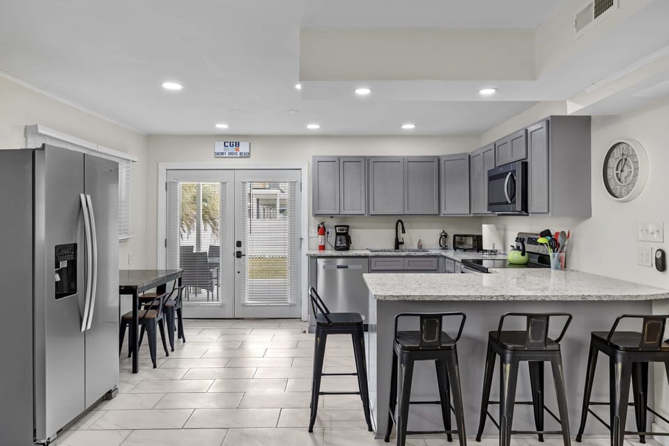 Kitchen looking to backyard