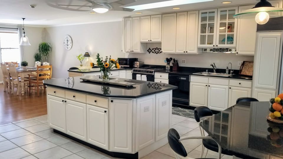 Eat in kitchen with lots of built in seating.