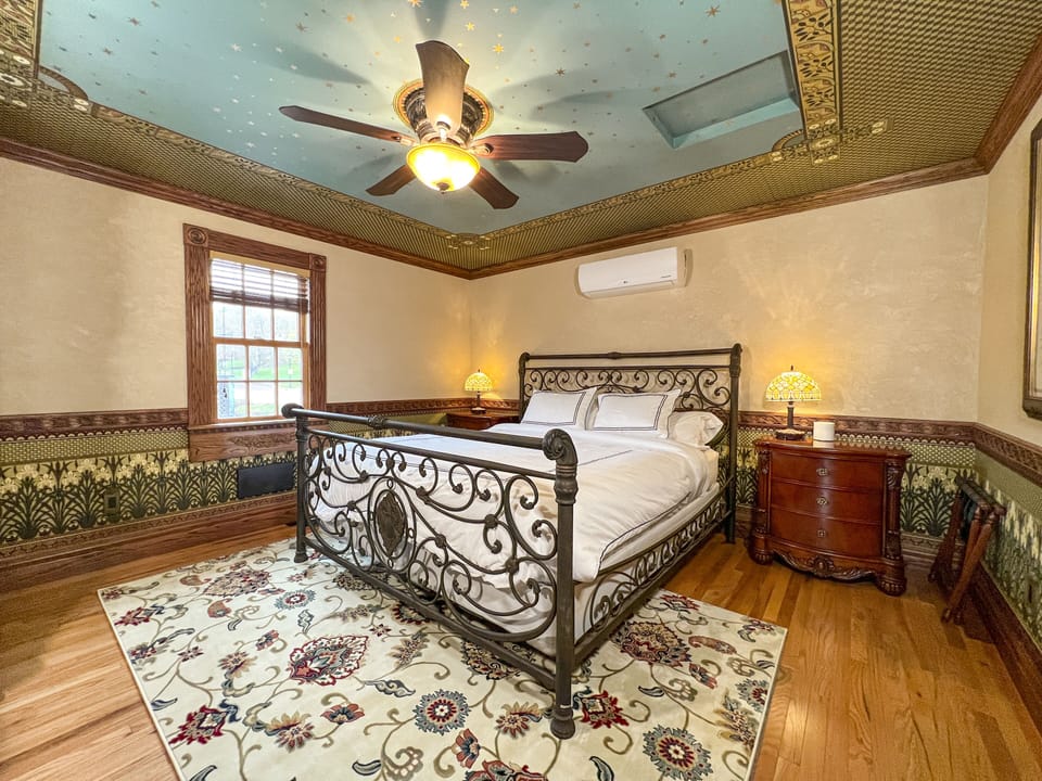 Bedroom with California king bed.