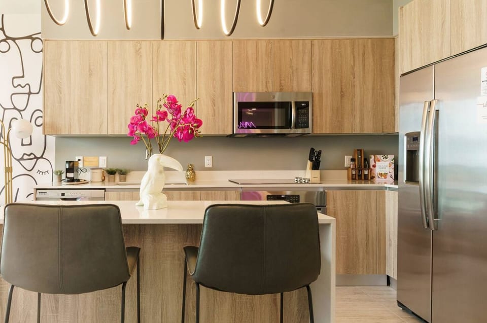 The kitchen island doubles as a breakfast bar.