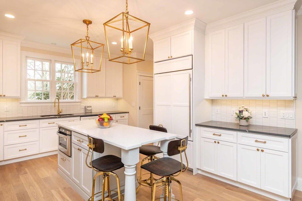 Kitchen Has Center Island with Built-In Microwave and Food Prep Area