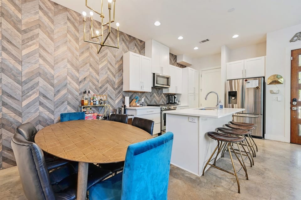 Step into the spacious kitchen and dining area of this open-concept home. 