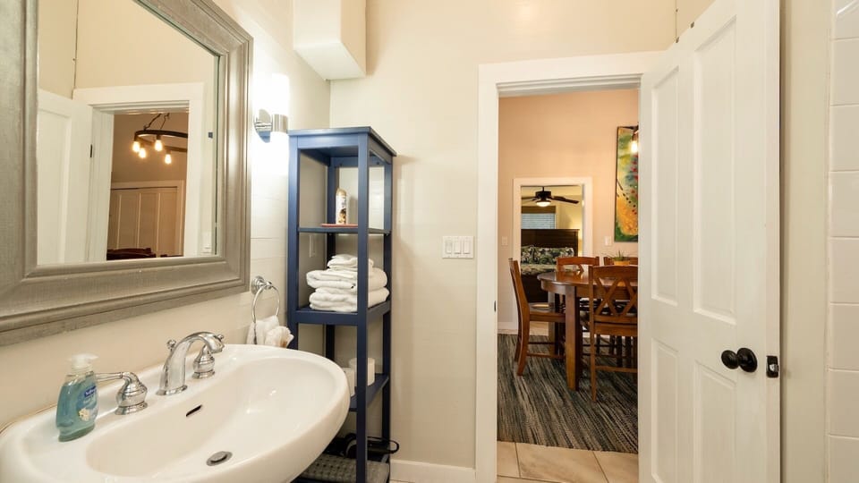 The second bath is conveniently located near the dining area...