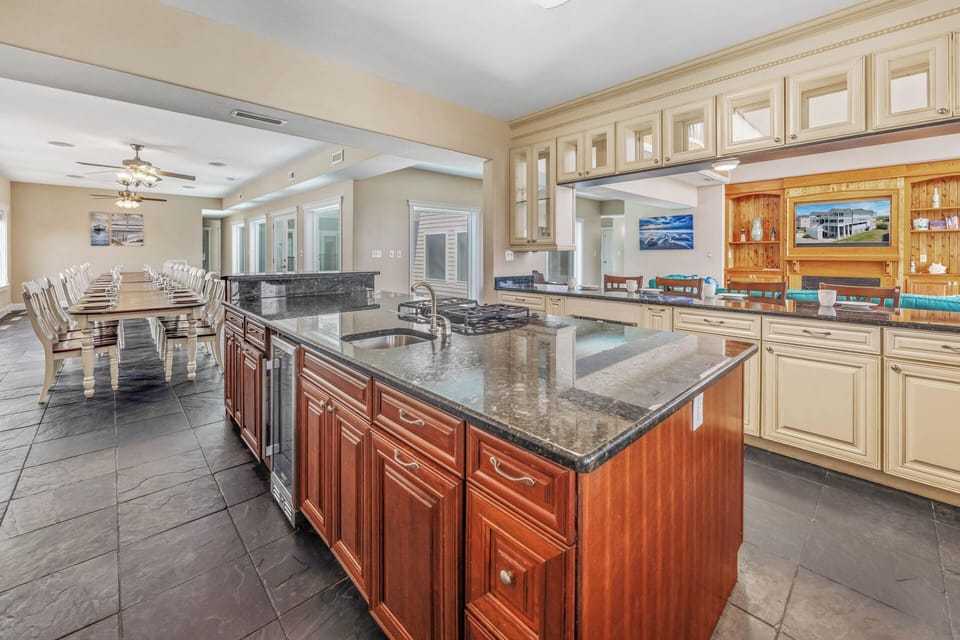 You won't miss a moment of the action thanks to the kitchen's open layout.