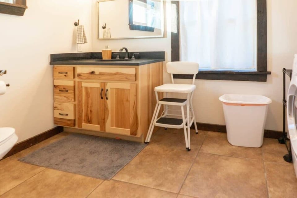 Convenient half bath for quick access without interrupting the main spaces. #HalfBath
