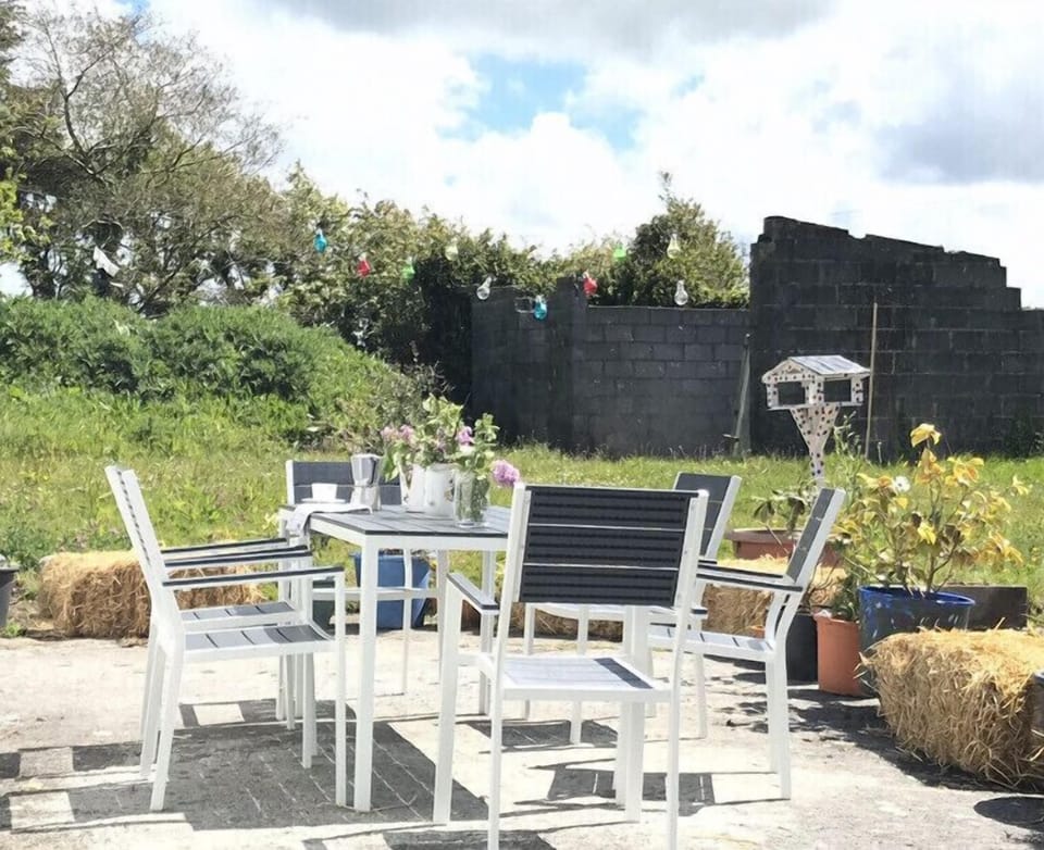 Outside patio area with table & chairs