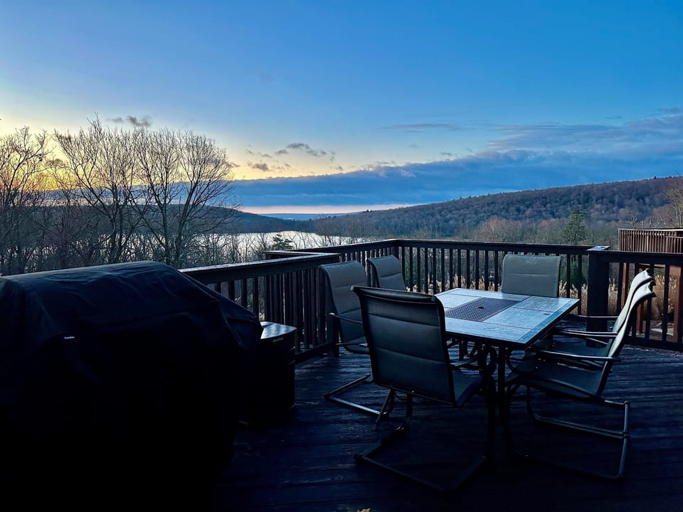 House 2 • Large Deck • Main Floor • Patio Table • Propane Gas Grill • Beautiful Mountain Views • Lake Views in the Winter