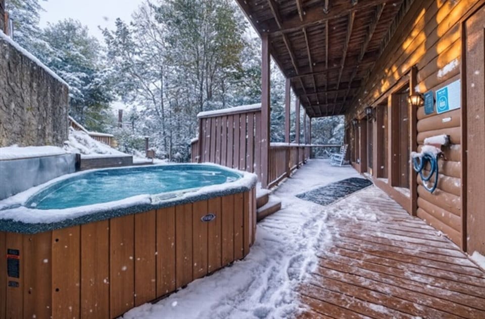 Soak under the stars in the private hot tub, the perfect way to unwind after full days spent together.