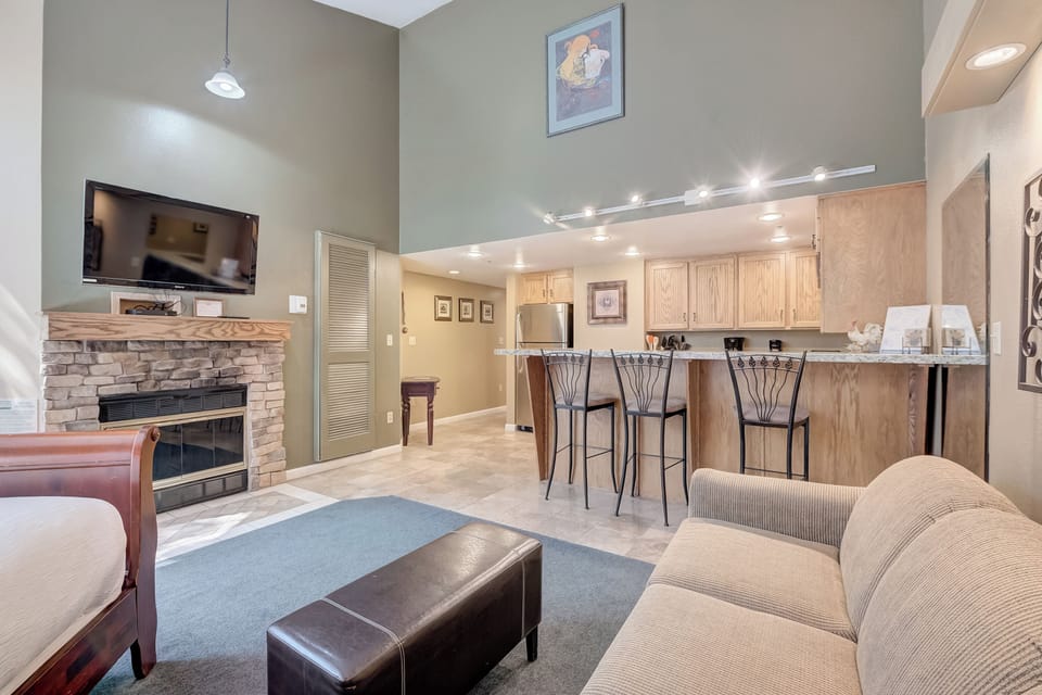 Living Area with King Bed and Sleeper Sofa / Kitchen