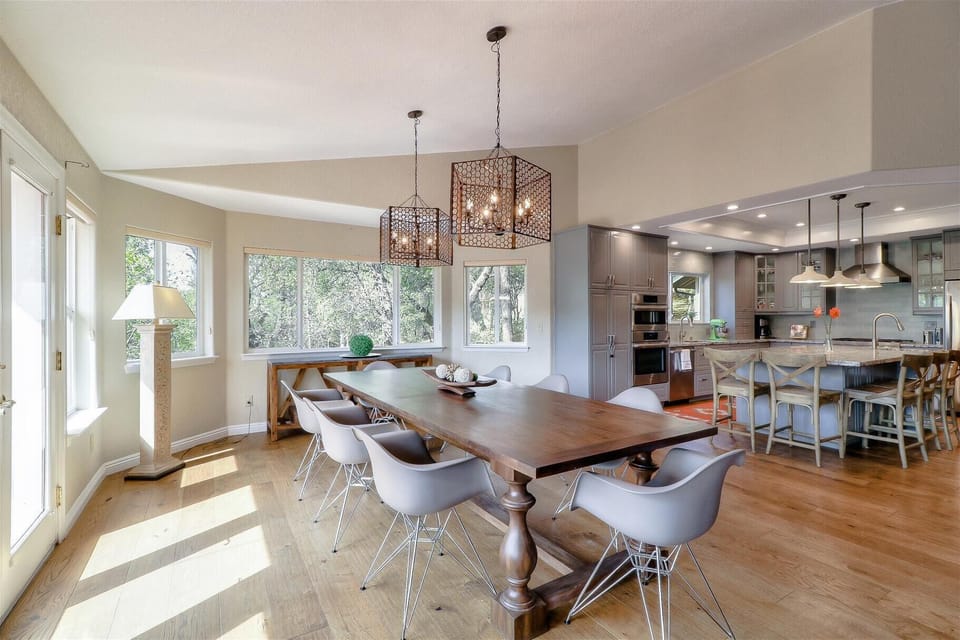 Dining room - 12 smaller white chairs replaced the grey chairs pictured here
