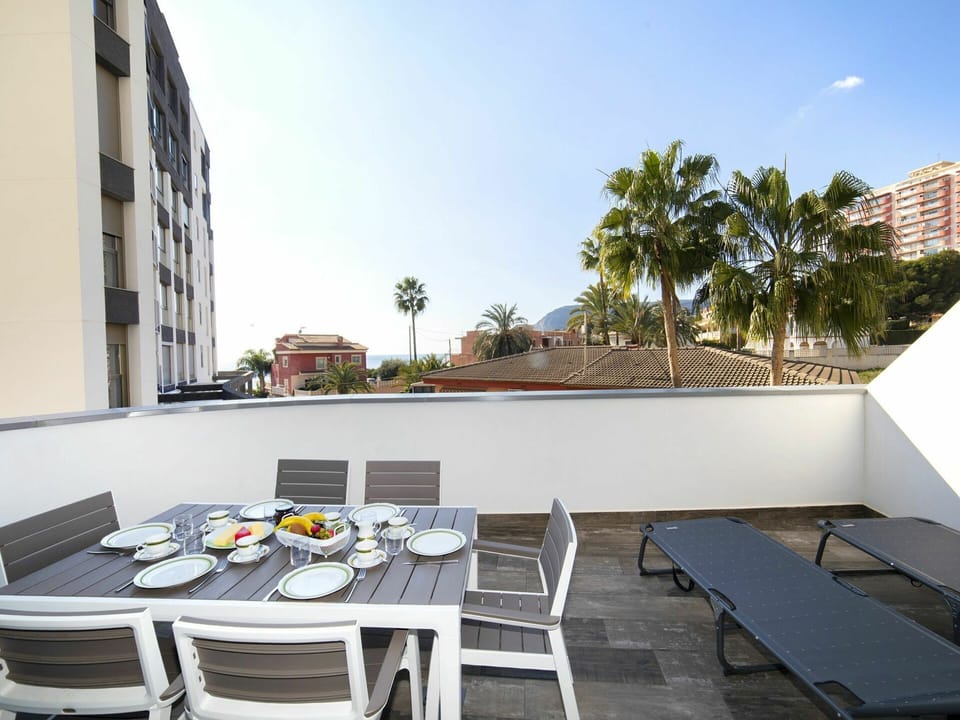 Table, Sky, Building, Furniture, Property, Chair, Azure, Tableware, Outdoor Furniture, Shade
