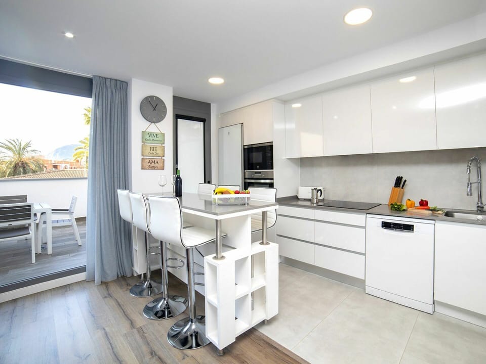 Countertop, Cabinetry, Building, Property, Furniture, Kitchen, Plant, House, Wood, Kitchen Appliance