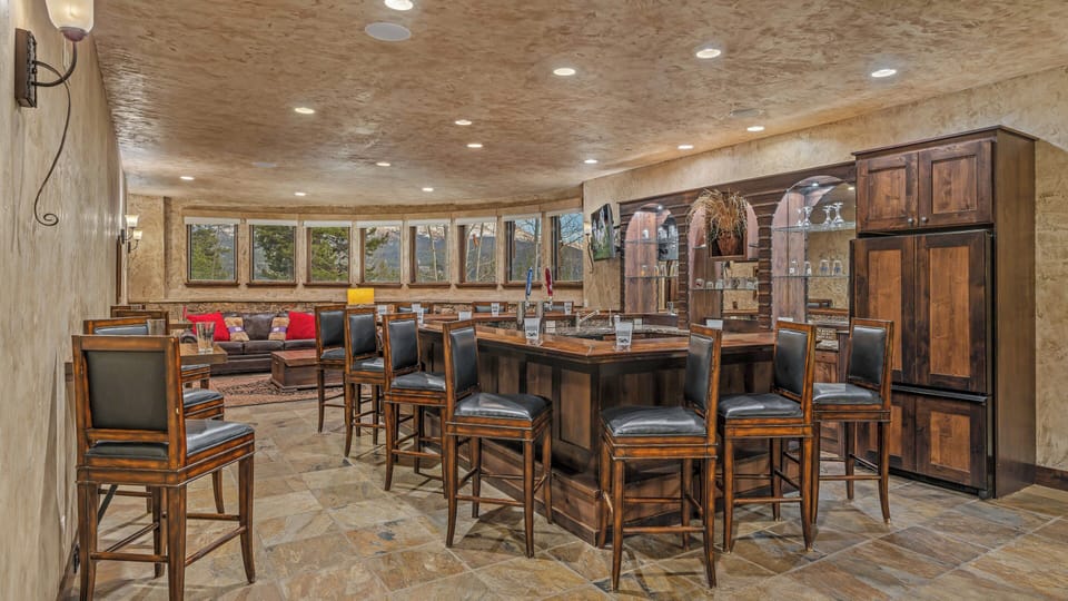 Lower level bar and seating with mountain views