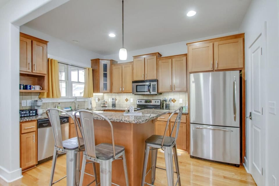 Cook in style in this well-equipped kitchen with an island and bar seating.