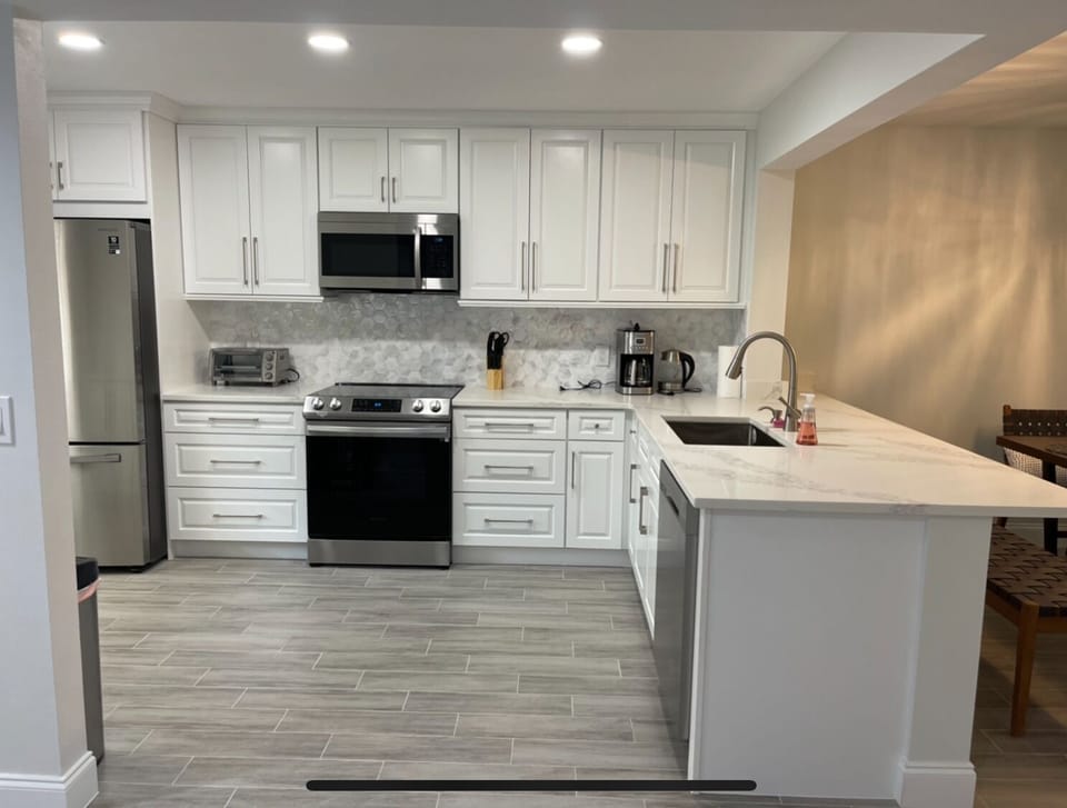 A fully equipped kitchen with modern appliances, ready for your culinary adventu