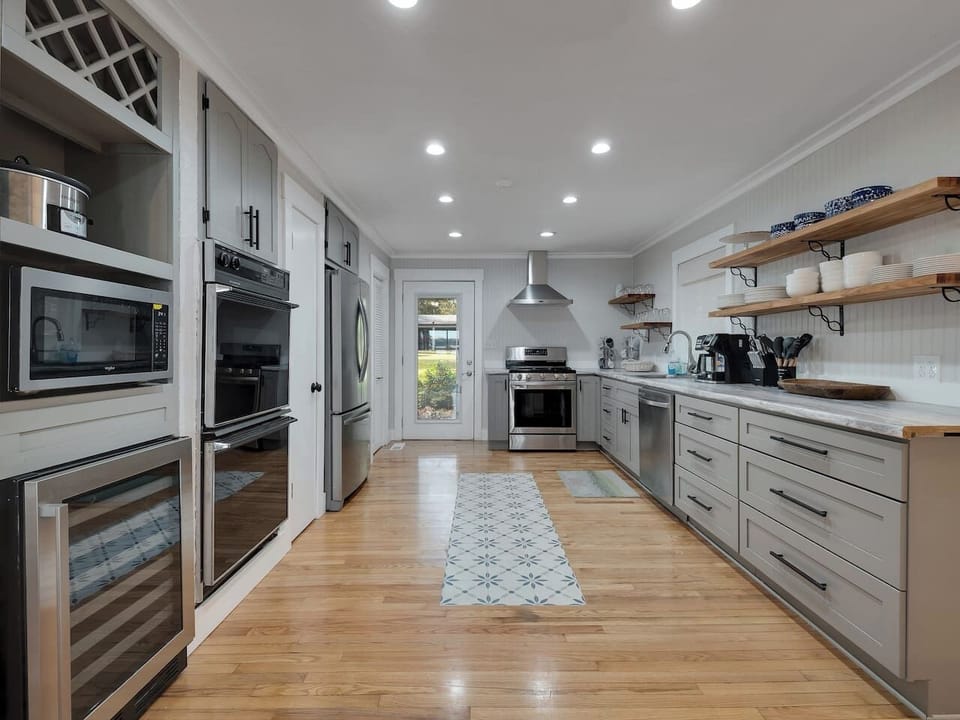 Gas range and oven, double electric oven, microwave, wine storage, icemaker