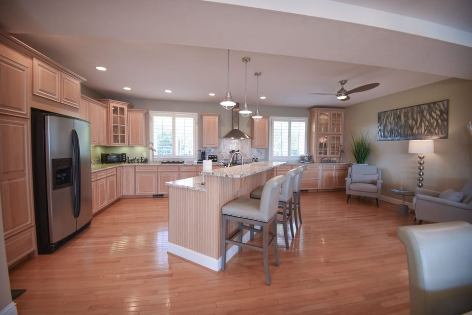 Open gourmet kitchen water views from every square