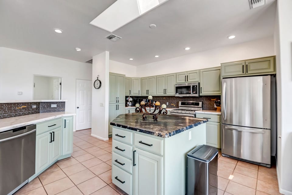 Spacious Kitchen with New Stainless Steel Appliances