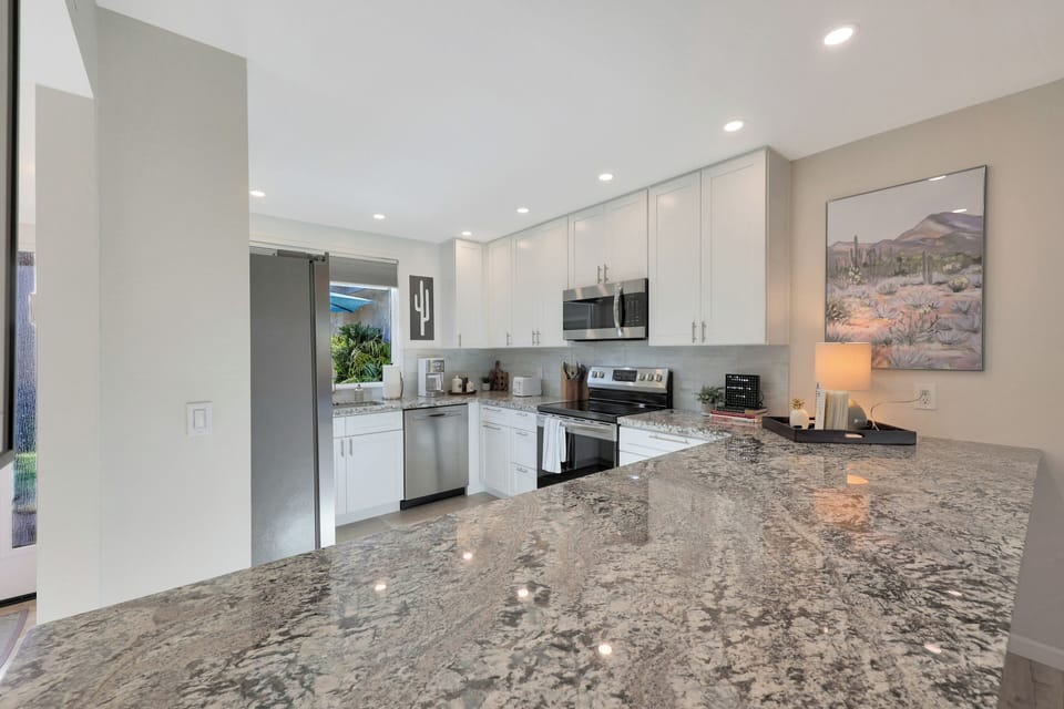 Lots of counter space in the airy kitchen.