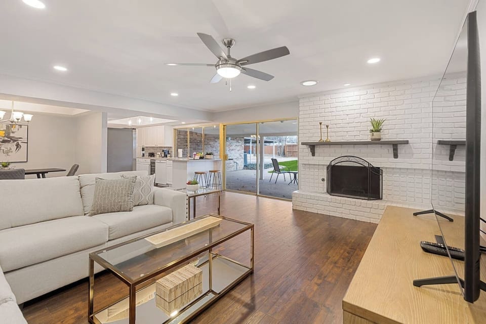 Living Room: Bright and inviting space with stylish decor and a seamless indoor-outdoor flow!