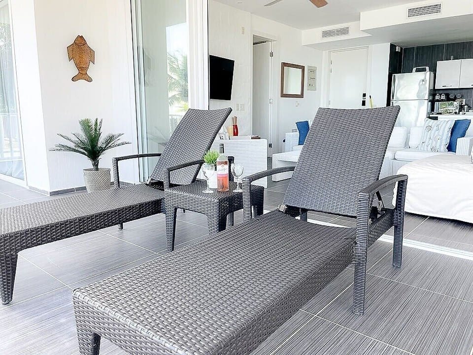 Indulge in relaxation on our spacious balcony, featuring two comfortable lounge chairs perfectly positioned to face the vast expanse of the ocean. Unwind, soak up the sun, and let the gentle sounds of the waves serenade you in this tranquil oasis.