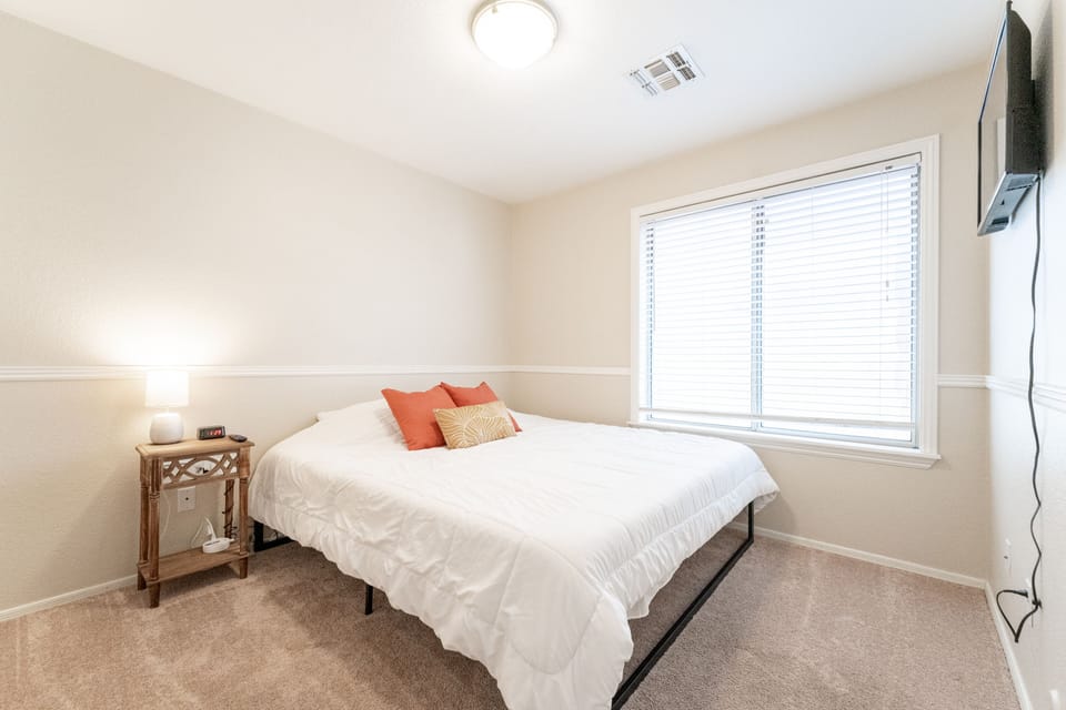 Bedroom number 2! King bed with smart tv.