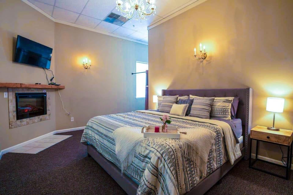 Stretch out on the king size bed and take in a movie and a fire