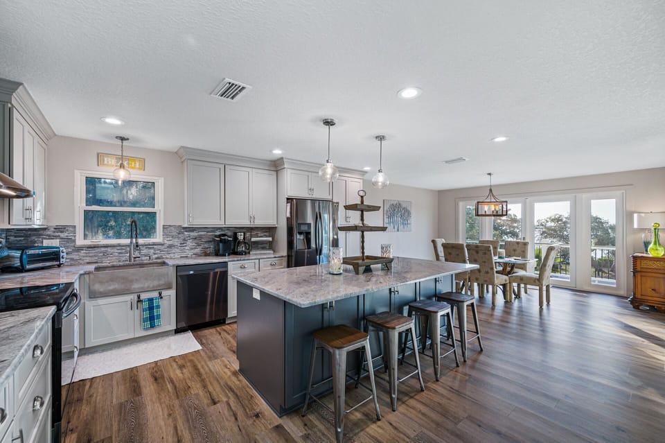 Kitchen with views of the Gulf. Keurig, coffee maker and all kitchen essentials.