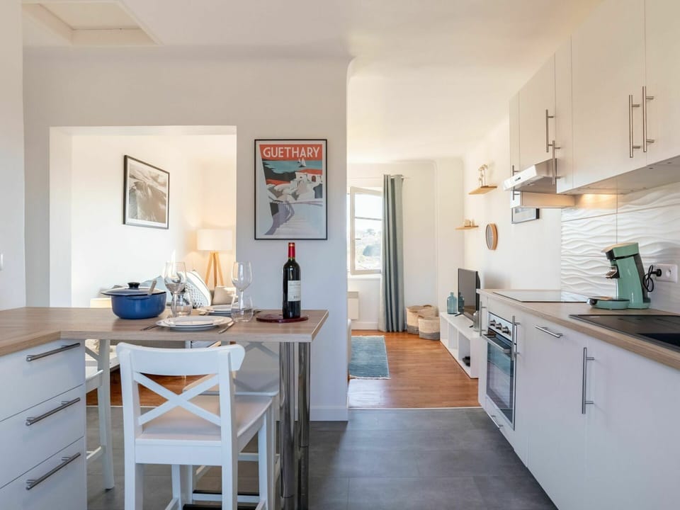Furniture, Cabinetry, Table, Countertop, Wood, Chair, Flooring, Kitchen, Floor, Desk