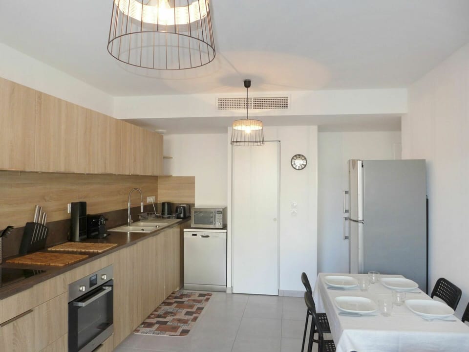 Cabinetry, Property, Furniture, Building, Countertop, Wood, Sink, Interior Design, Lighting, Chair
