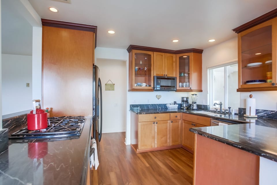 Plenty of counter space and well appointed kitchen has all the basic necessities.