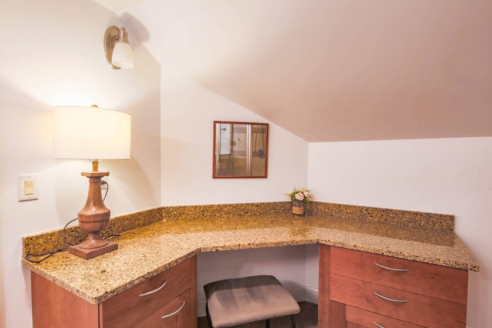 The master bathroom aloso features this large makeup vanity.