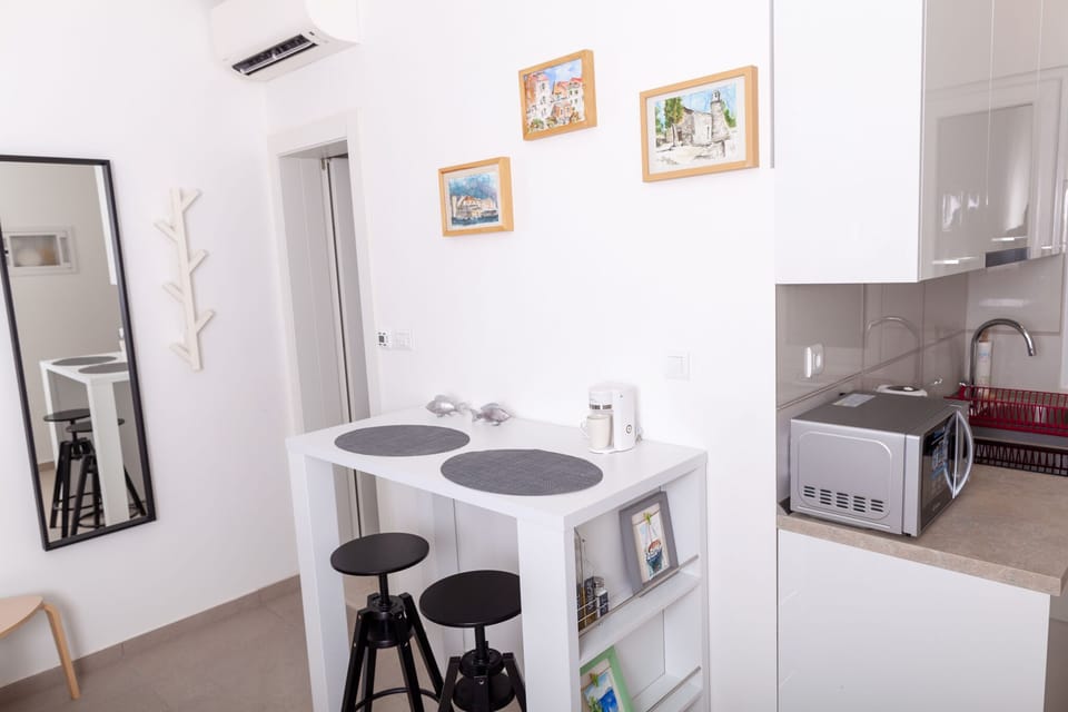 Kitchenette with dining table. 