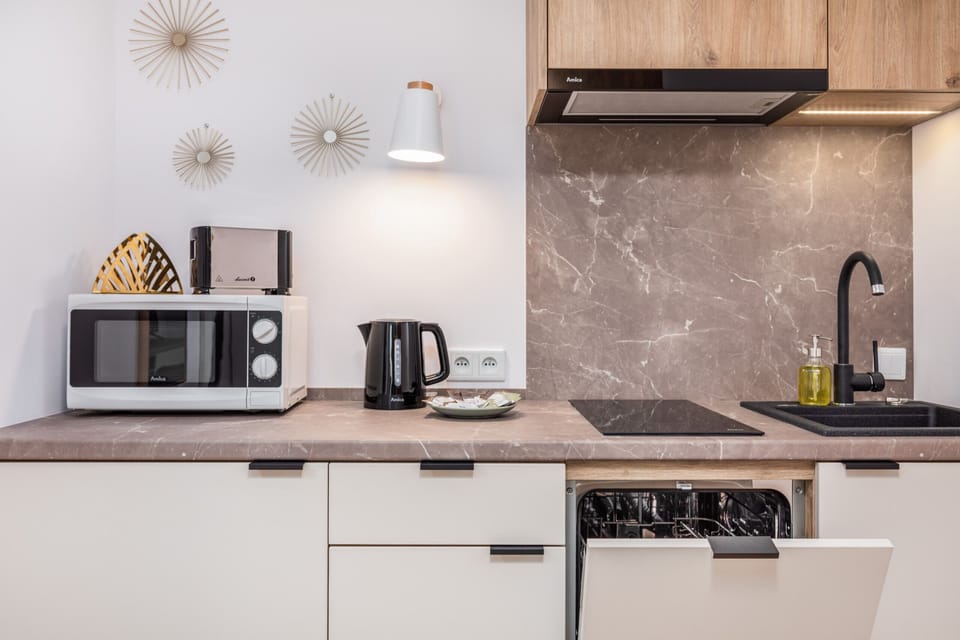 The dishwasher that ensures easy cleanup after meals.